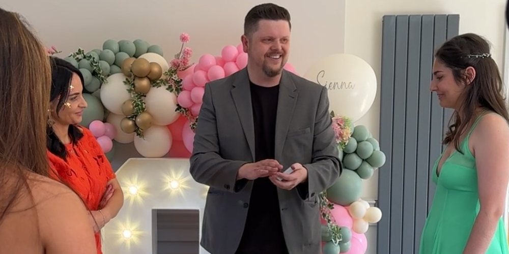 Guests amazed by magic tricks in Preston